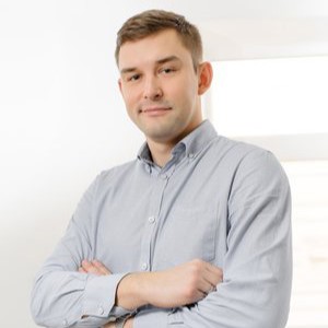 Андрей Холуев